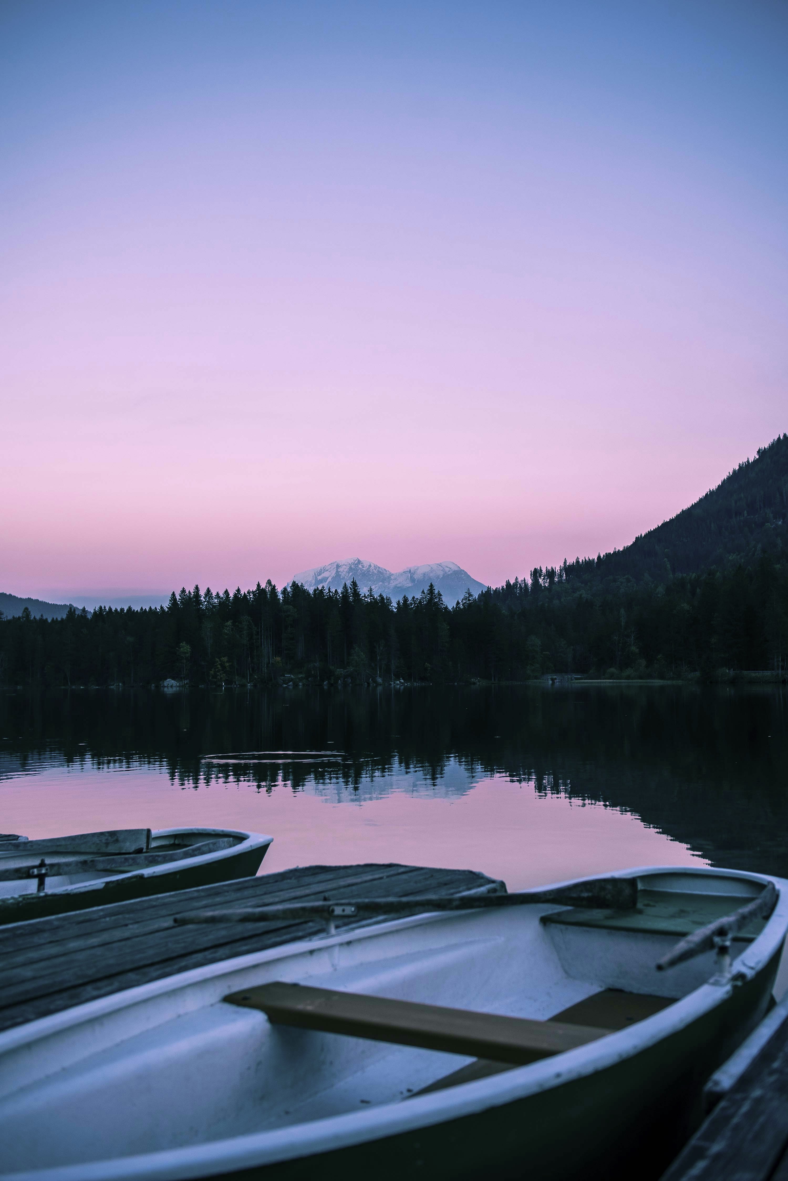 a couple of boats that are sitting in the water