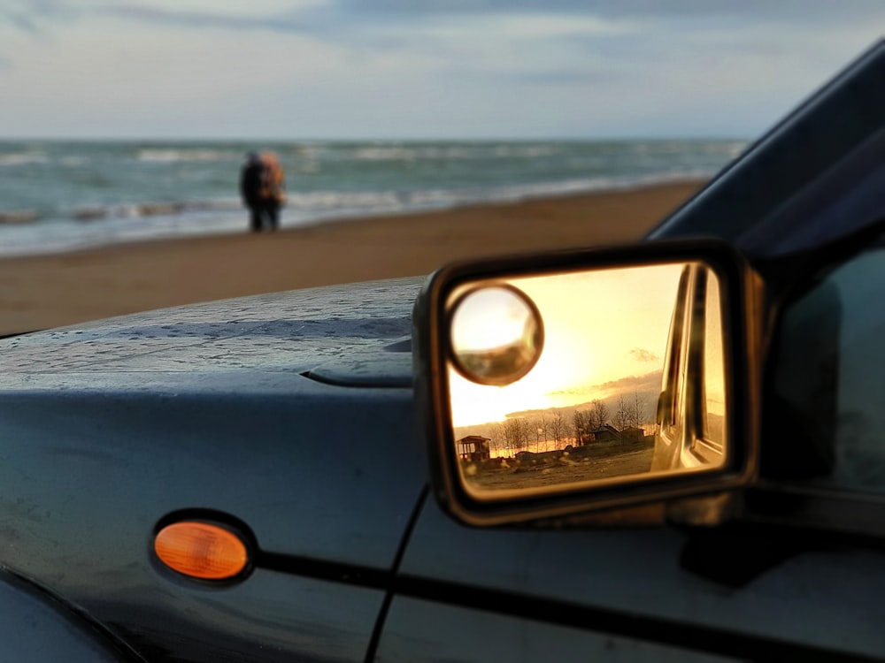 a side view mirror on the side of a car