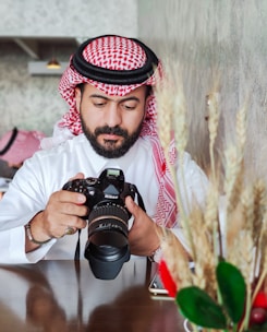 a man taking a picture with a camera
