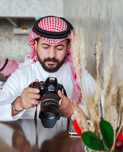 a man taking a picture with a camera
