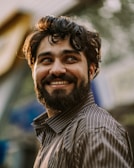 A joyful moment from a live interview with a guest speaker sharing faith stories on camera.