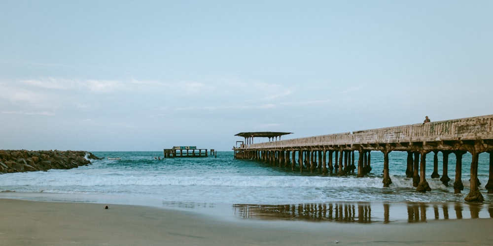 a pier that is next to a body of water