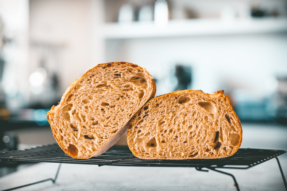 a couple of slices of bread sitting on top of a cooling rack