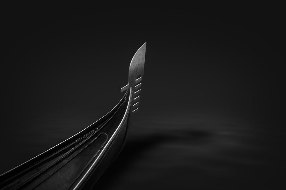a black and white photo of a fork