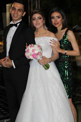 a couple of people standing next to each other