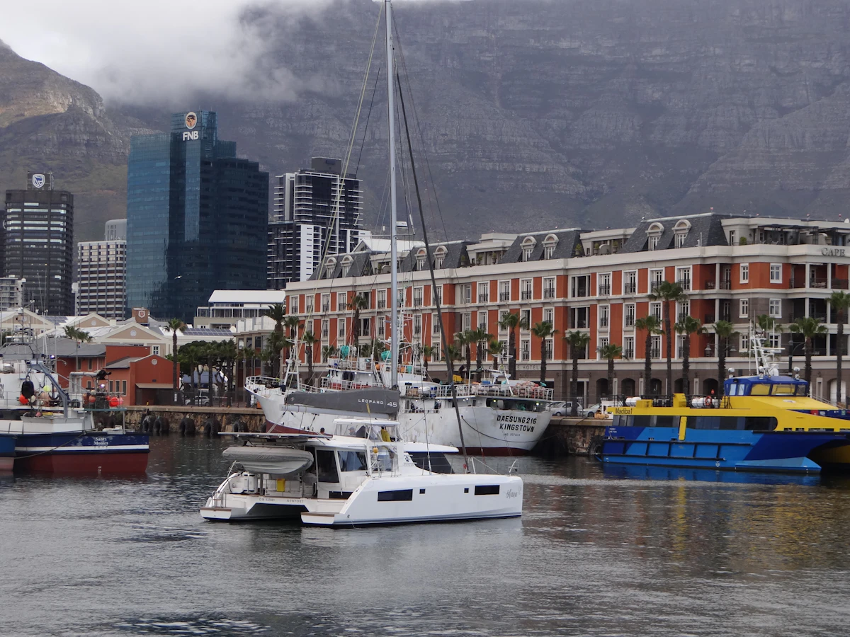 Working harbor and Cape Wheel at V&A Waterfront