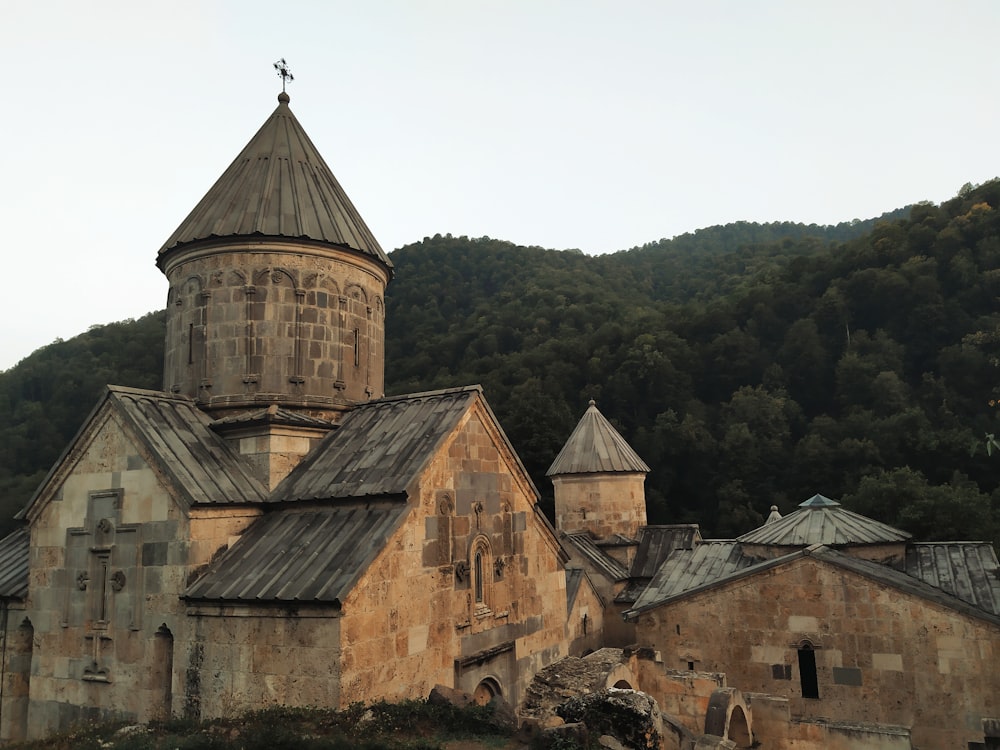 an old building with a cross on top of it