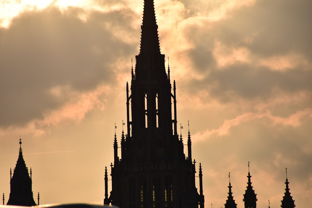 a large clock tower towering over a city