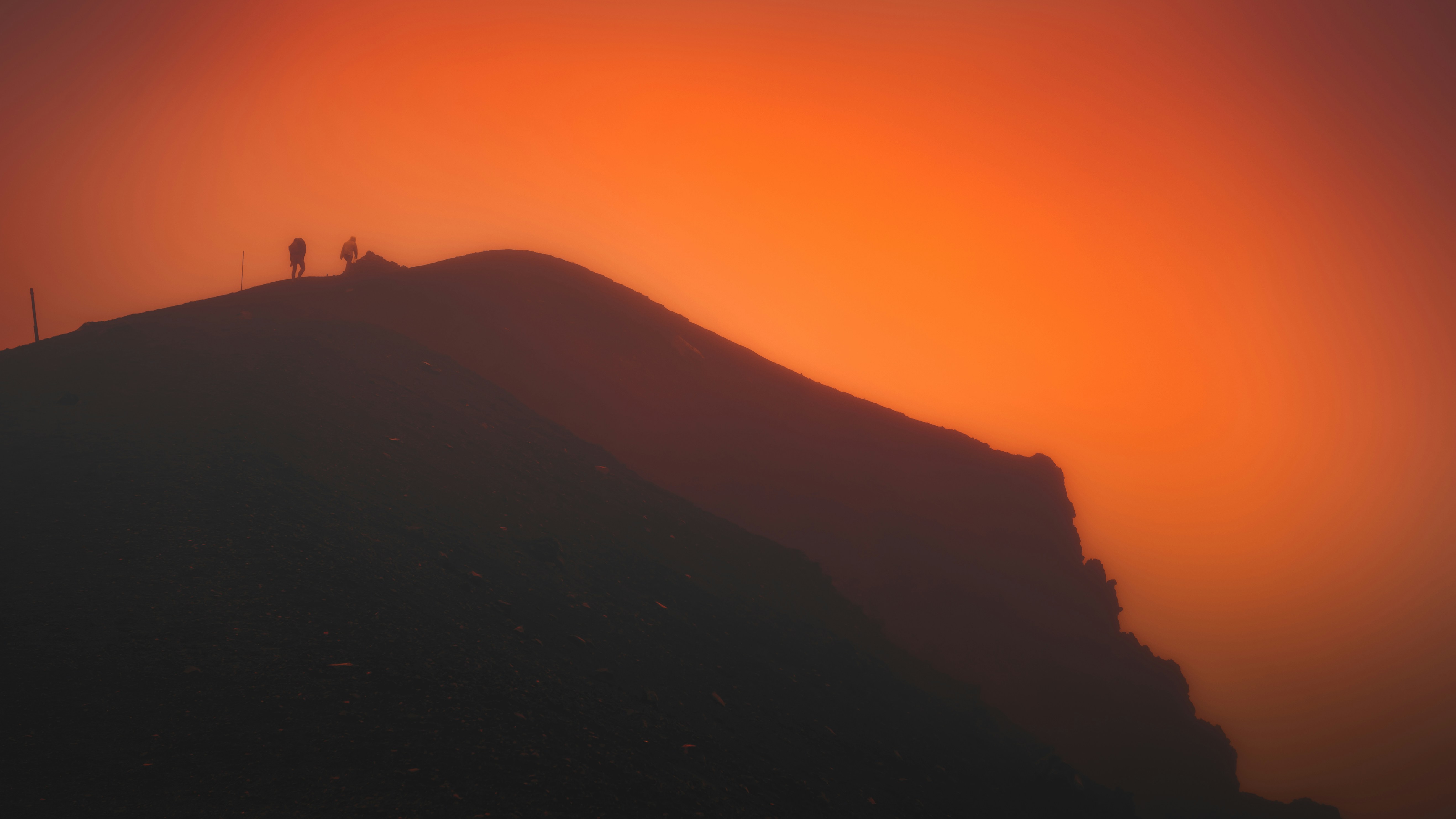 An abstract image representing success, perhaps a person reaching the peak of a mountain against a sunrise, conveying a sense of journey and achievement.