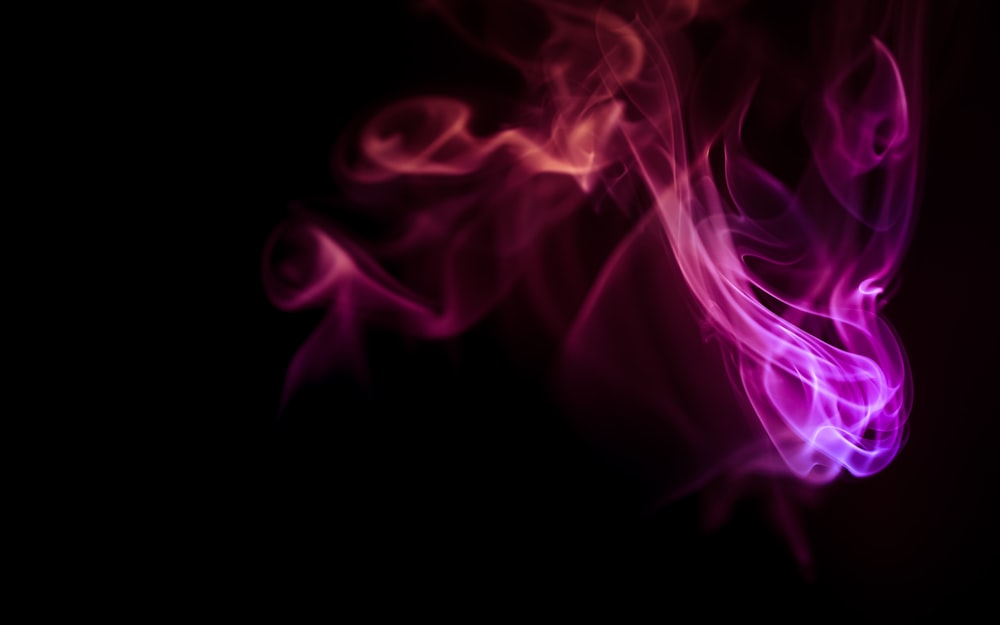 a close up of smoke on a black background