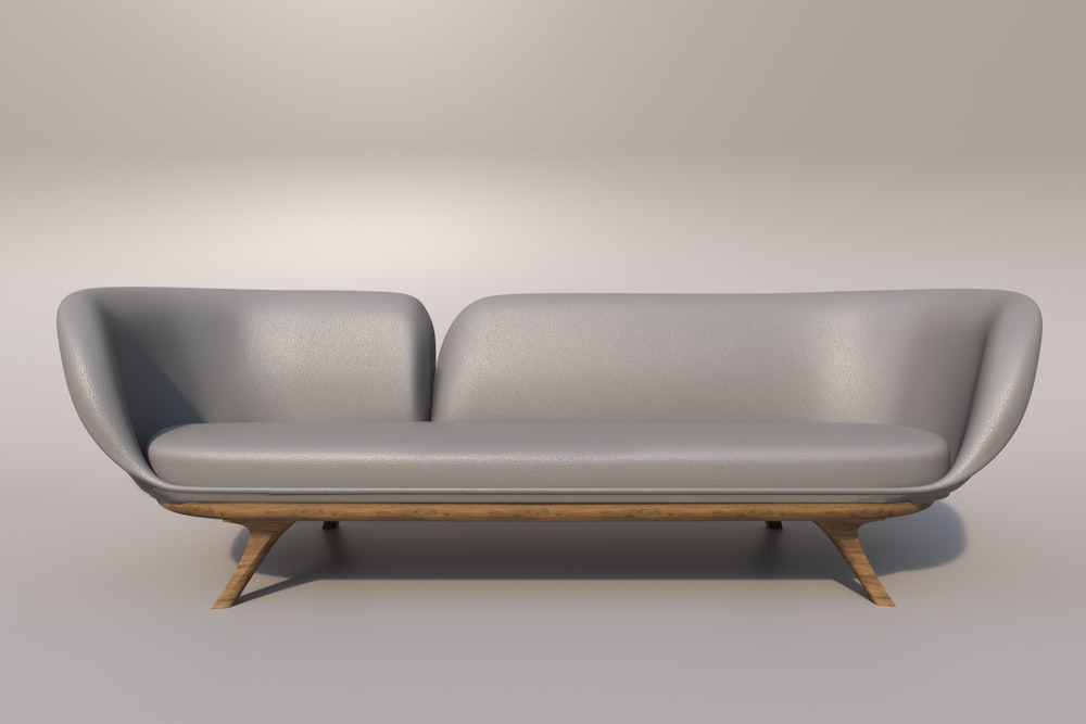 a gray couch with a wooden base on a gray background