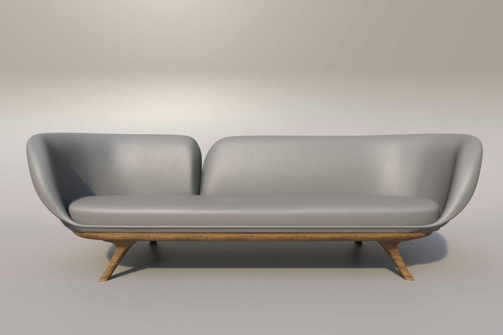 The Luna Sofa, a curved three-seater on angled oak legs