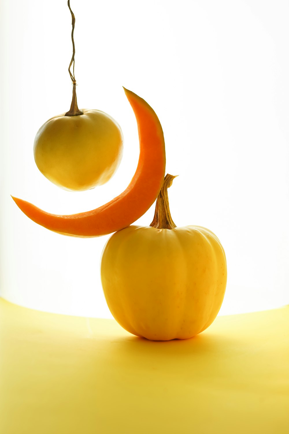 a couple of oranges sitting on top of a table