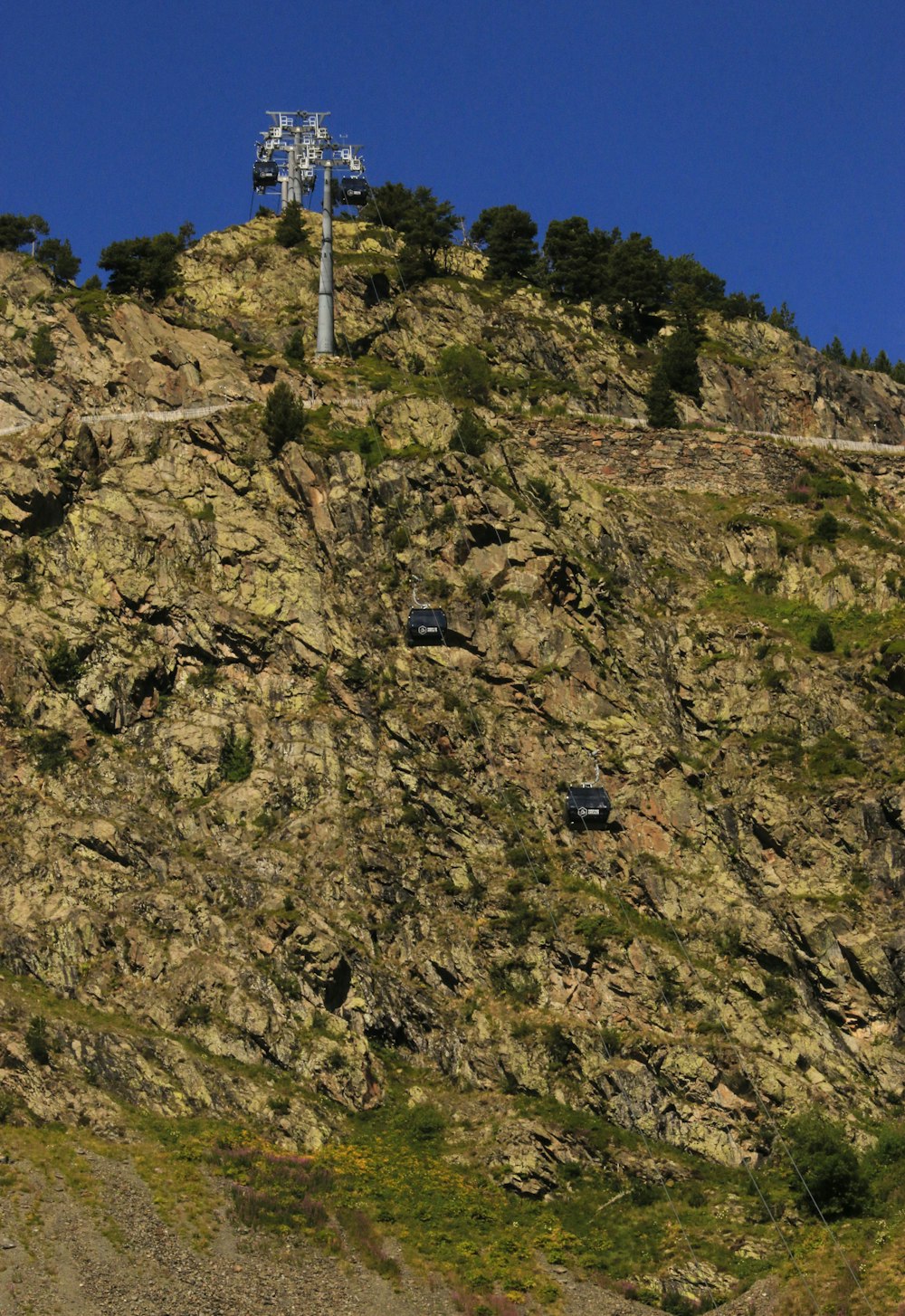 a hill with a telephone pole on top of it