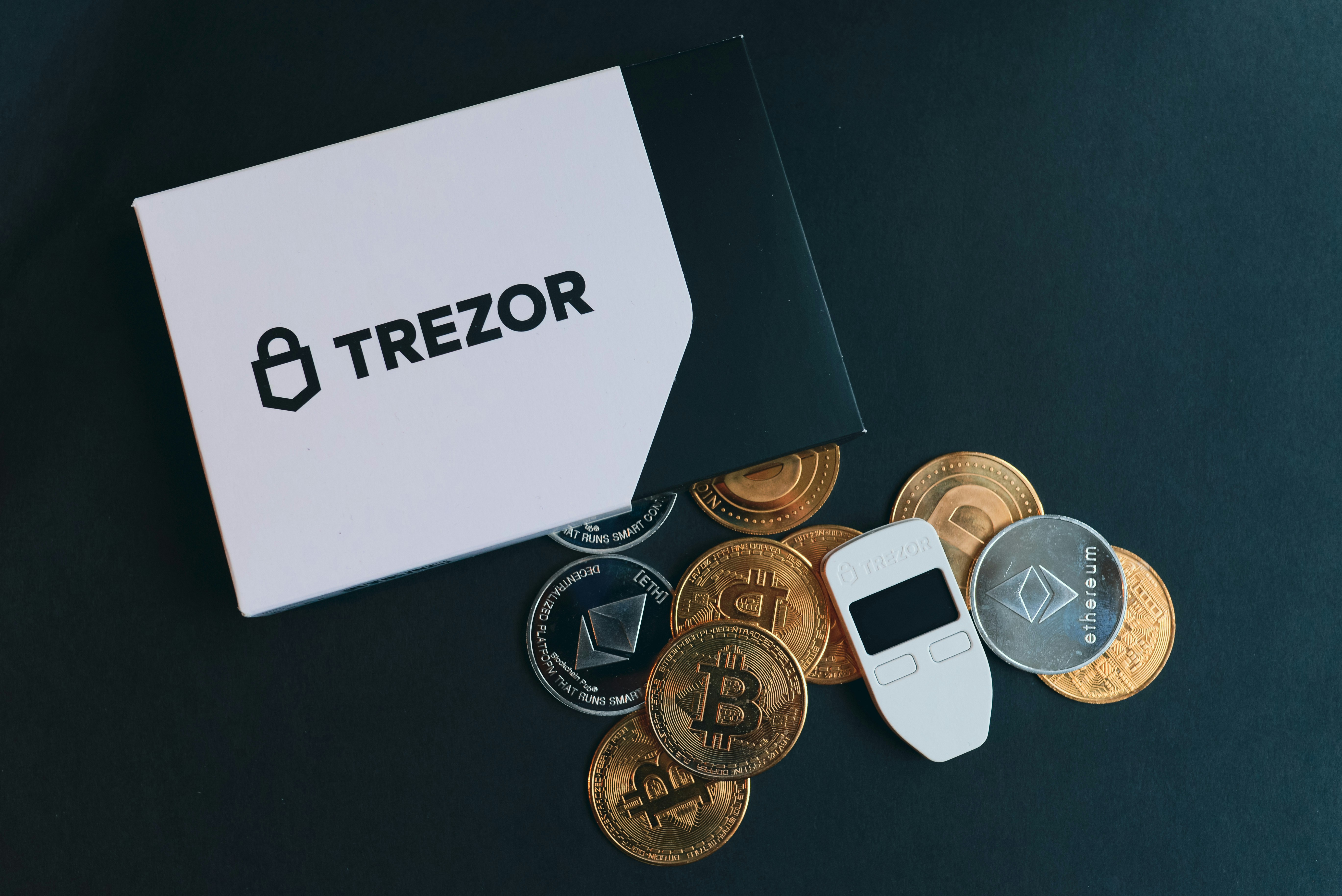 A pile of coins and a calculator next to it