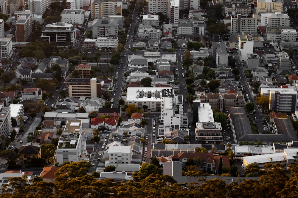 an aerial view of a city with tall buildings