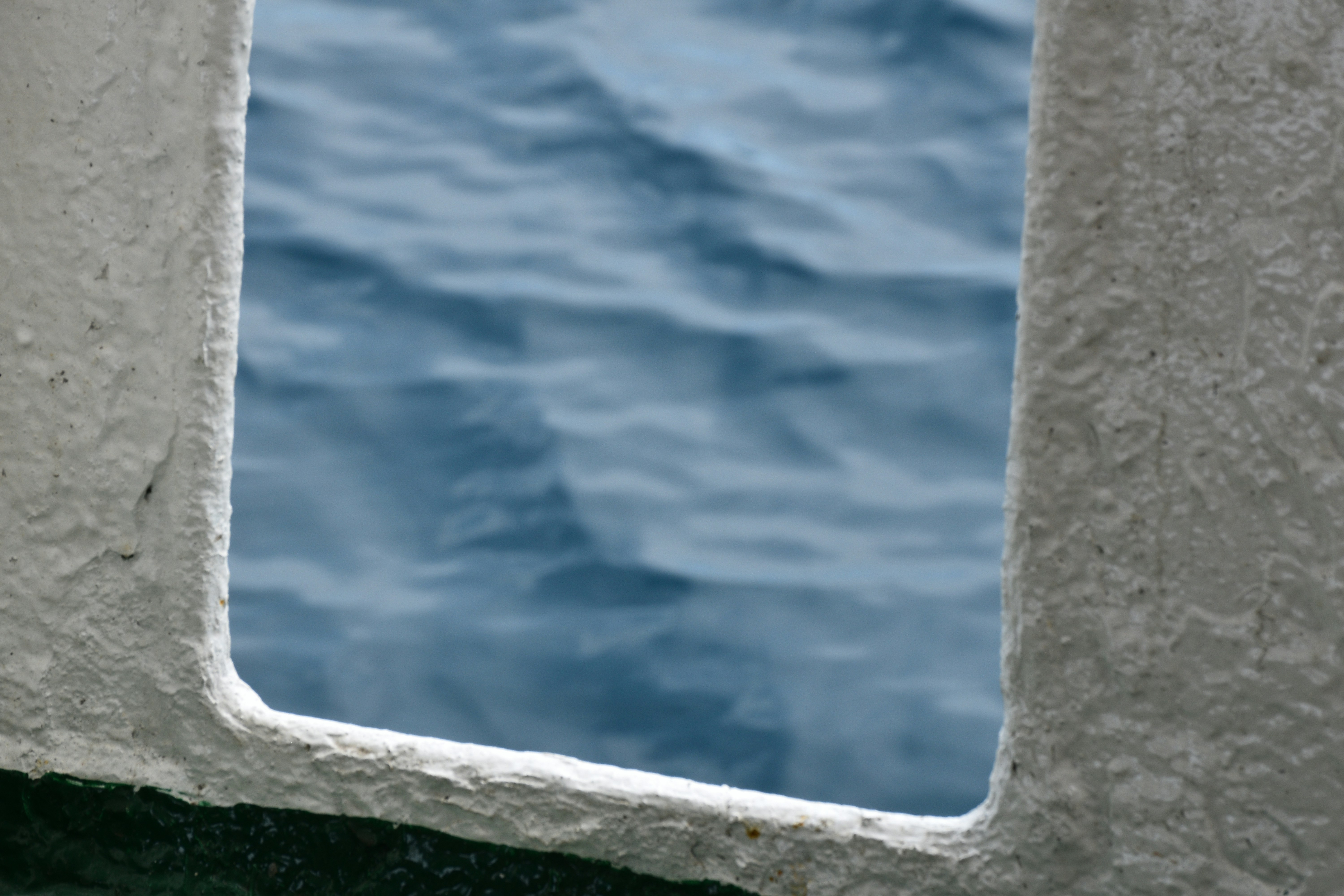 A close up of a window with water in the background photo – Free Nature ...