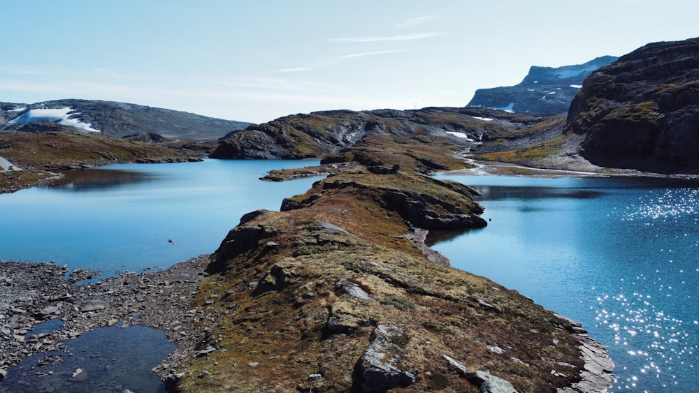 a large body of water surrounded by mountains