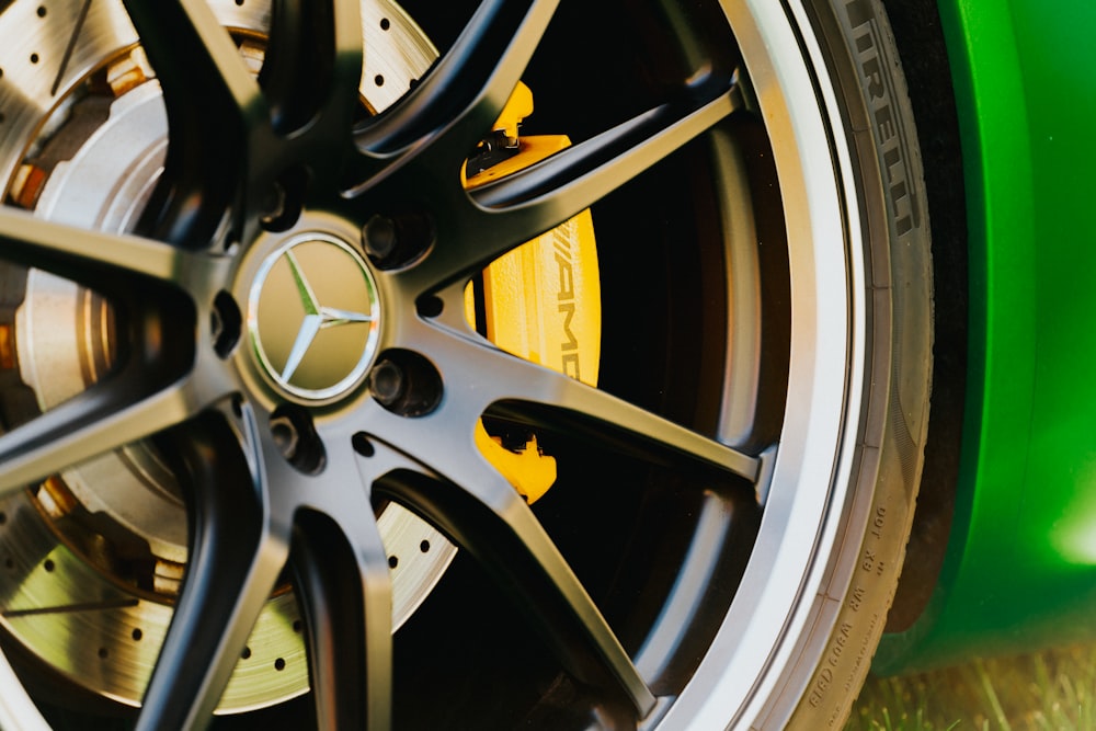 a close up of a wheel on a sports car