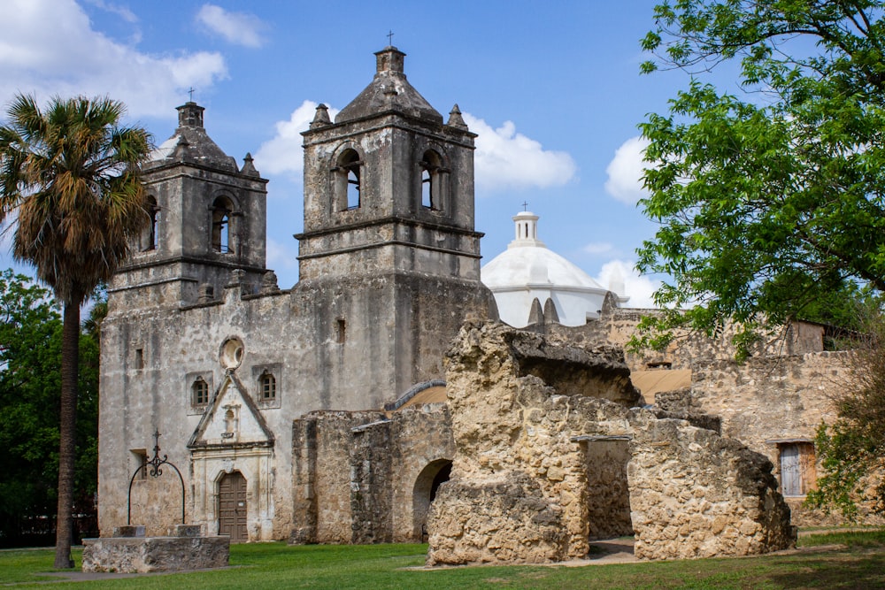 a very old building with two towers and a dome