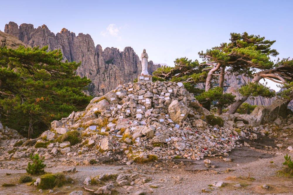 a pile of rocks in the middle of a mountain