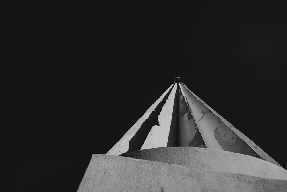 a black and white photo of the top of a building