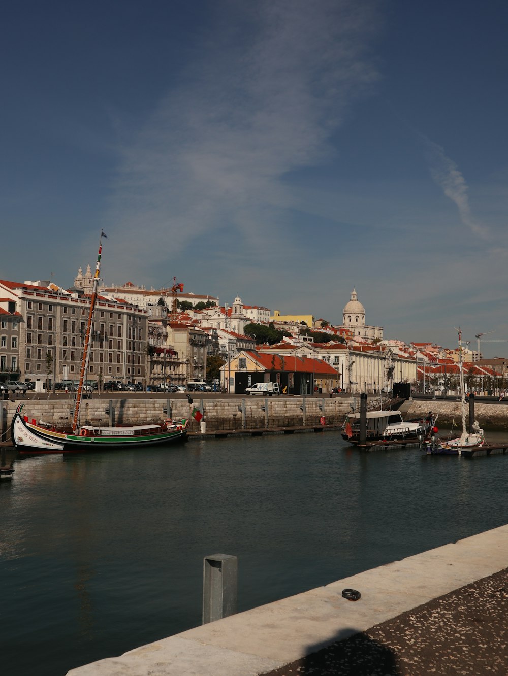 a body of water with a bunch of boats in it