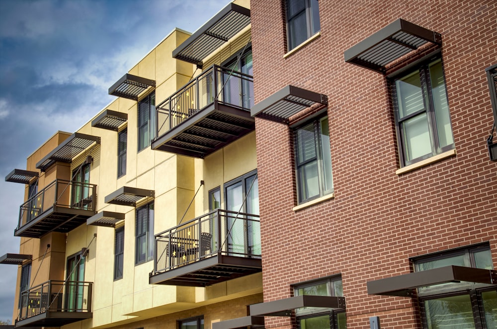 a row of multi - story buildings with balconies and balconies on