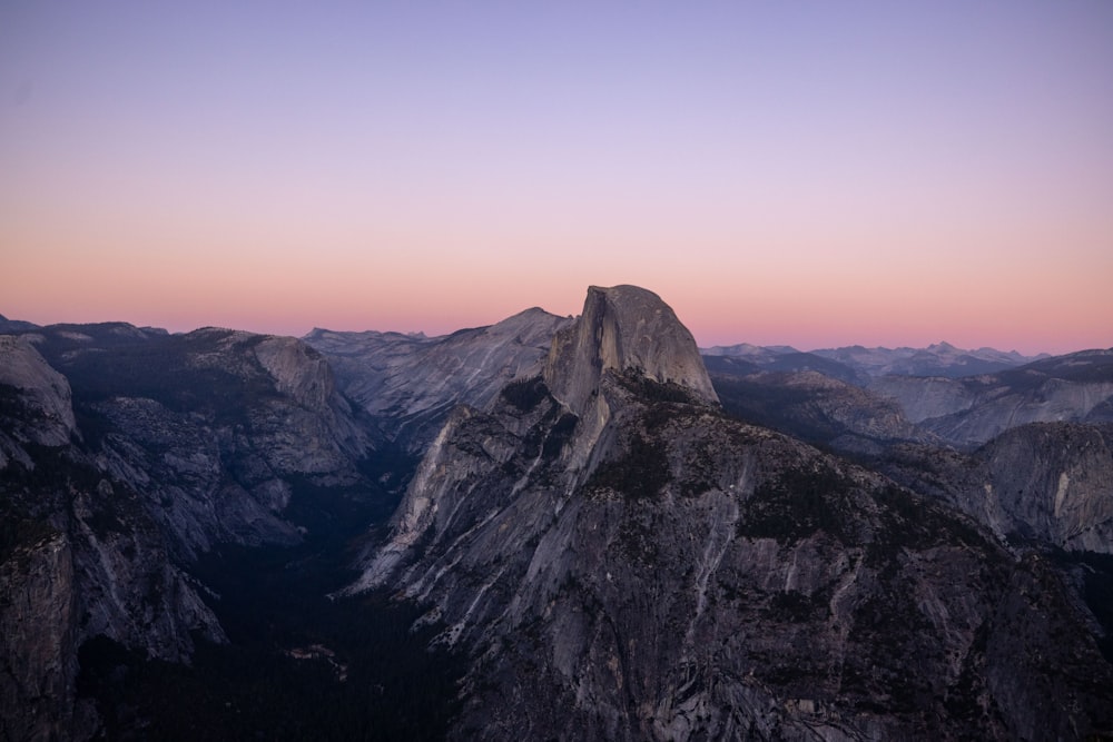 a view of the mountains from the top of a mountain