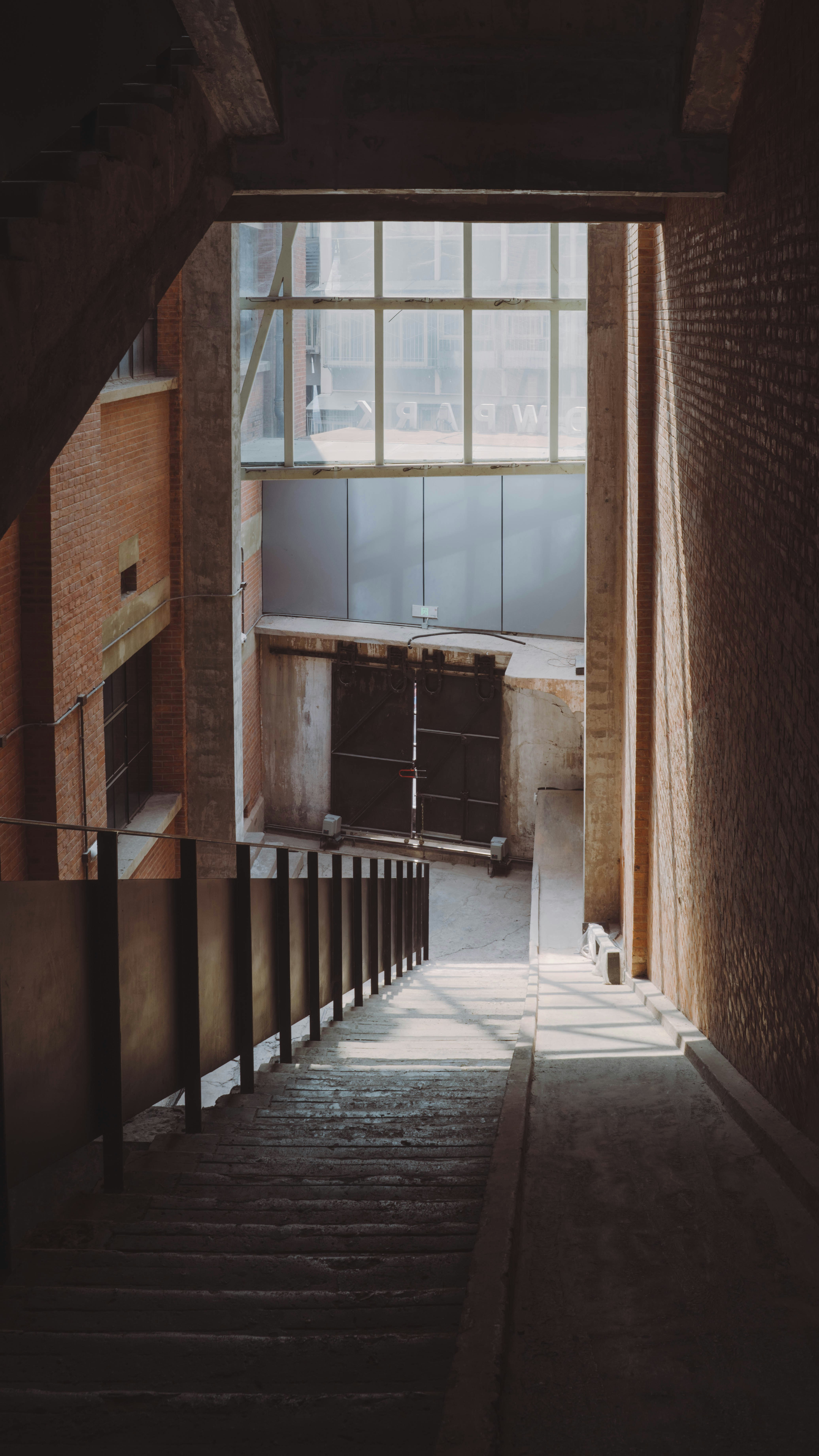 a stairway leading to a kitchen in a building