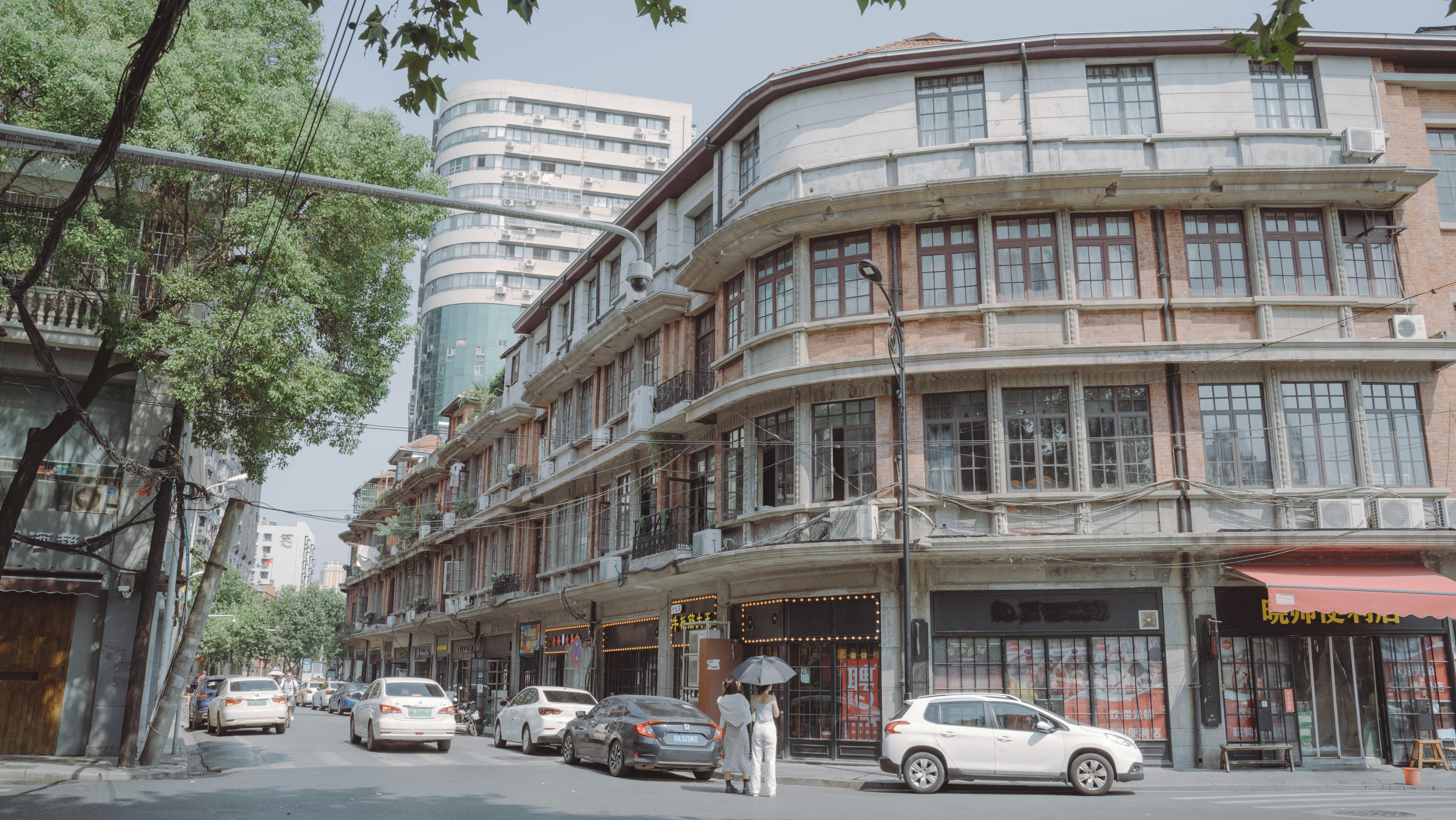 a group of cars parked on the side of a road