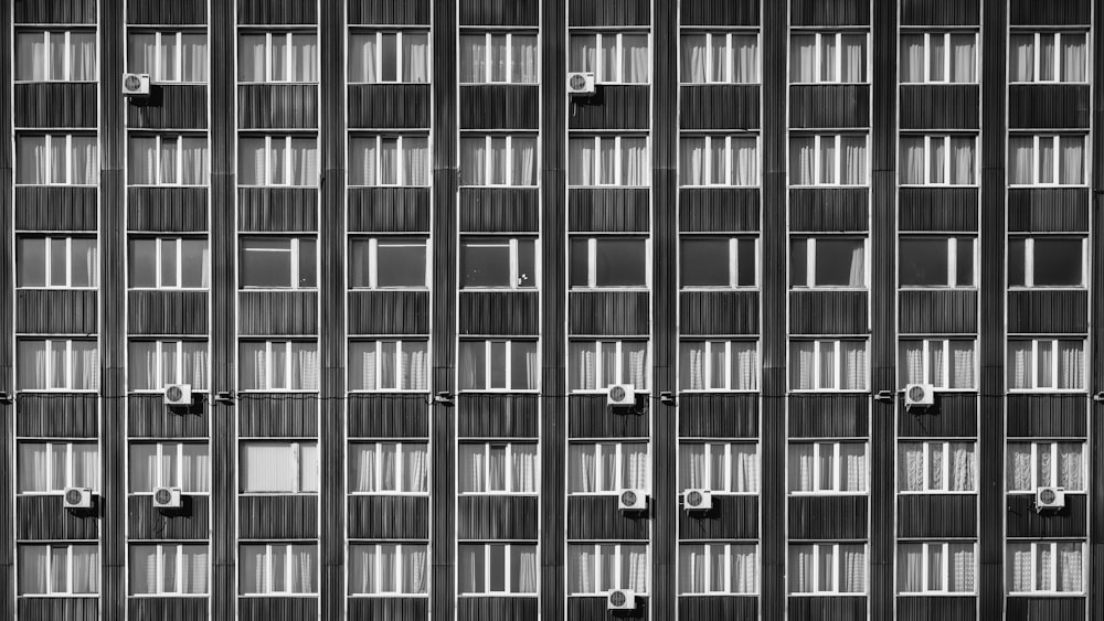 a black and white photo of a tall building