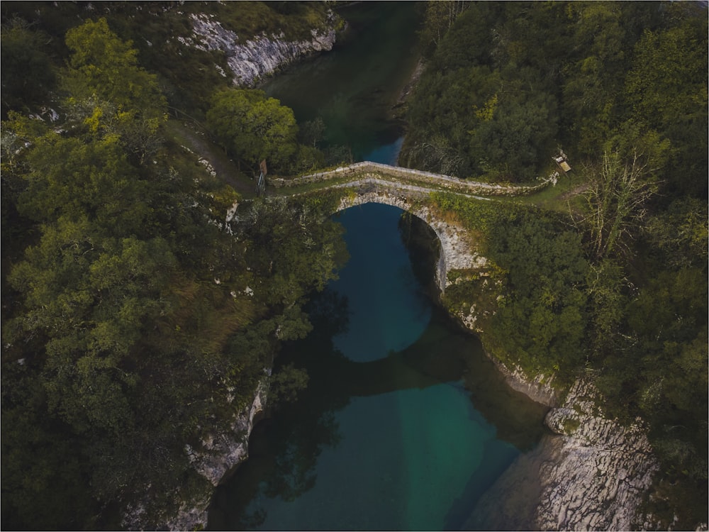 an aerial view of a bridge over a river