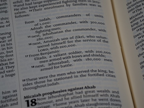 a close up of an open book with text