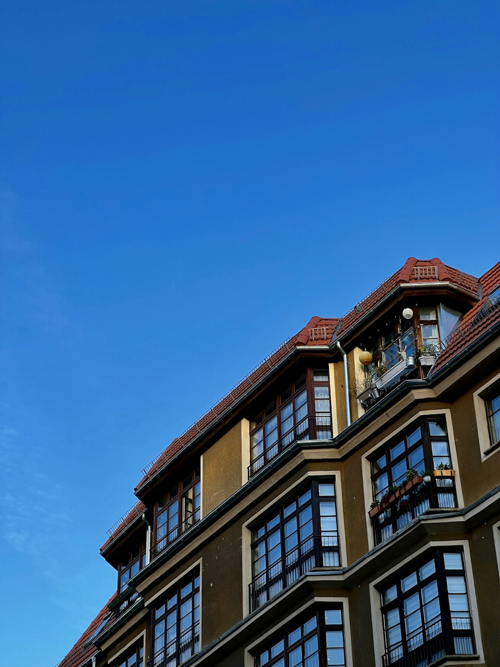 a tall building with lots of windows on top of it