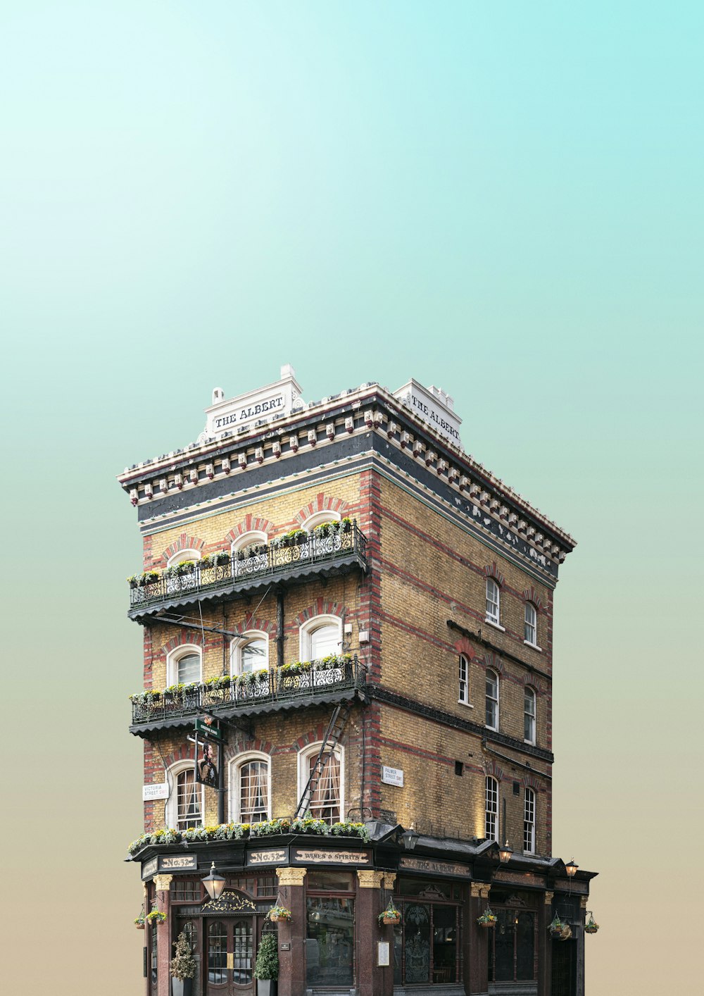 a tall brick building with a balcony and balconies