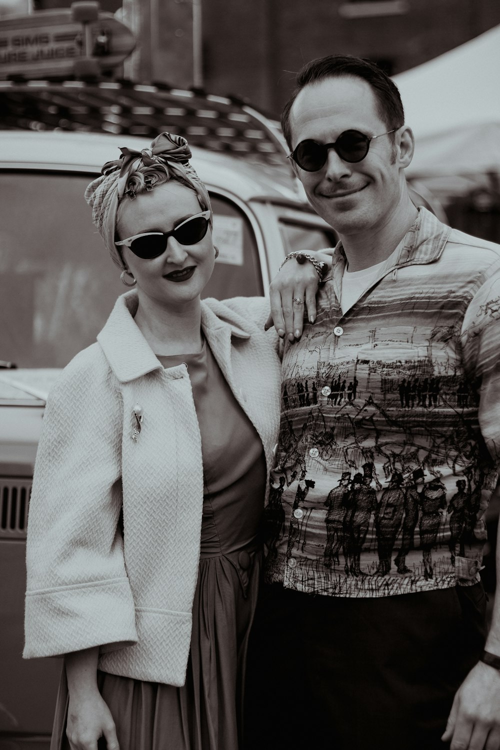 a man and a woman standing next to each other