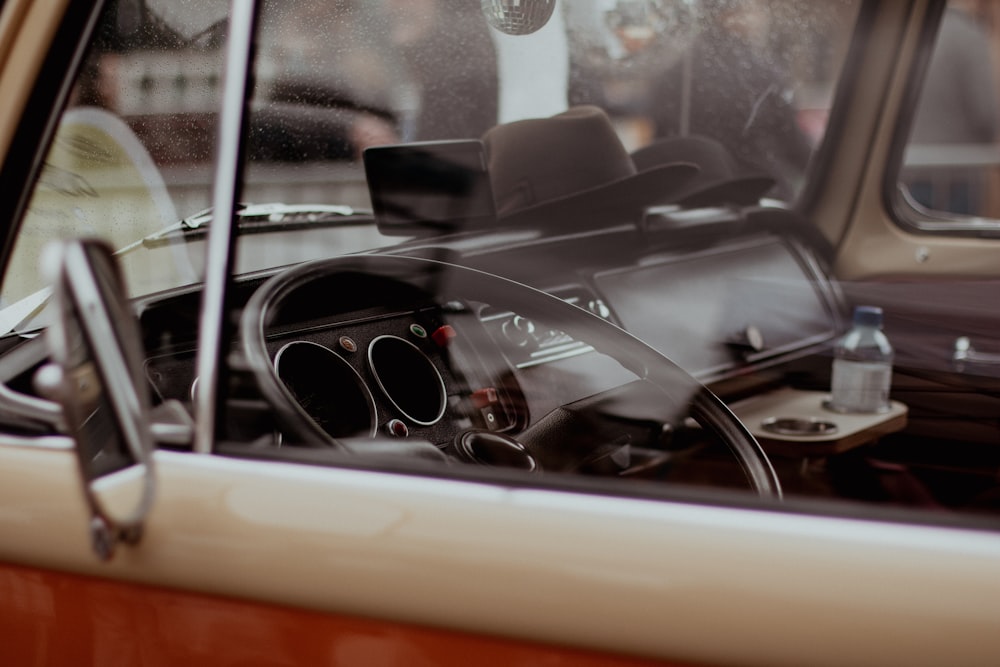 the interior of a car with a steering wheel