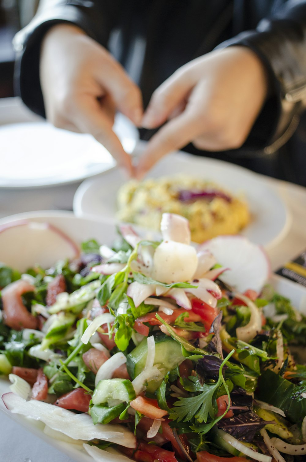 a plate of food with a salad on it