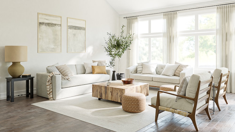 a living room filled with furniture and a large window