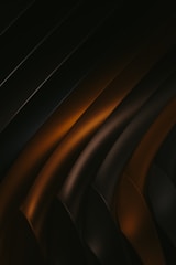 a black and brown abstract background with curves