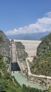 a large dam in the middle of a river