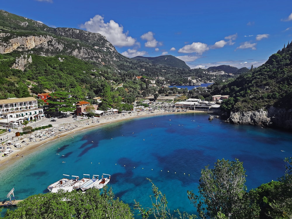 a view of a beach with boats in the water