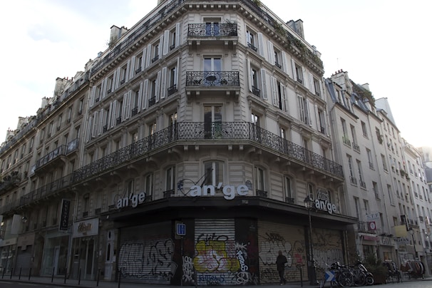 Charming Parisian apartment facade with classic wrought-iron balconies