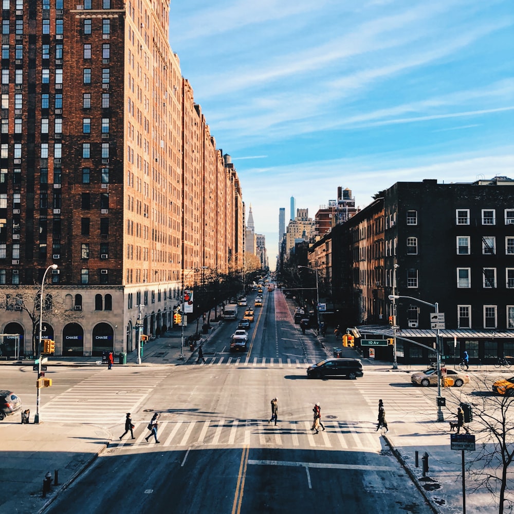 a city street filled with lots of tall buildings