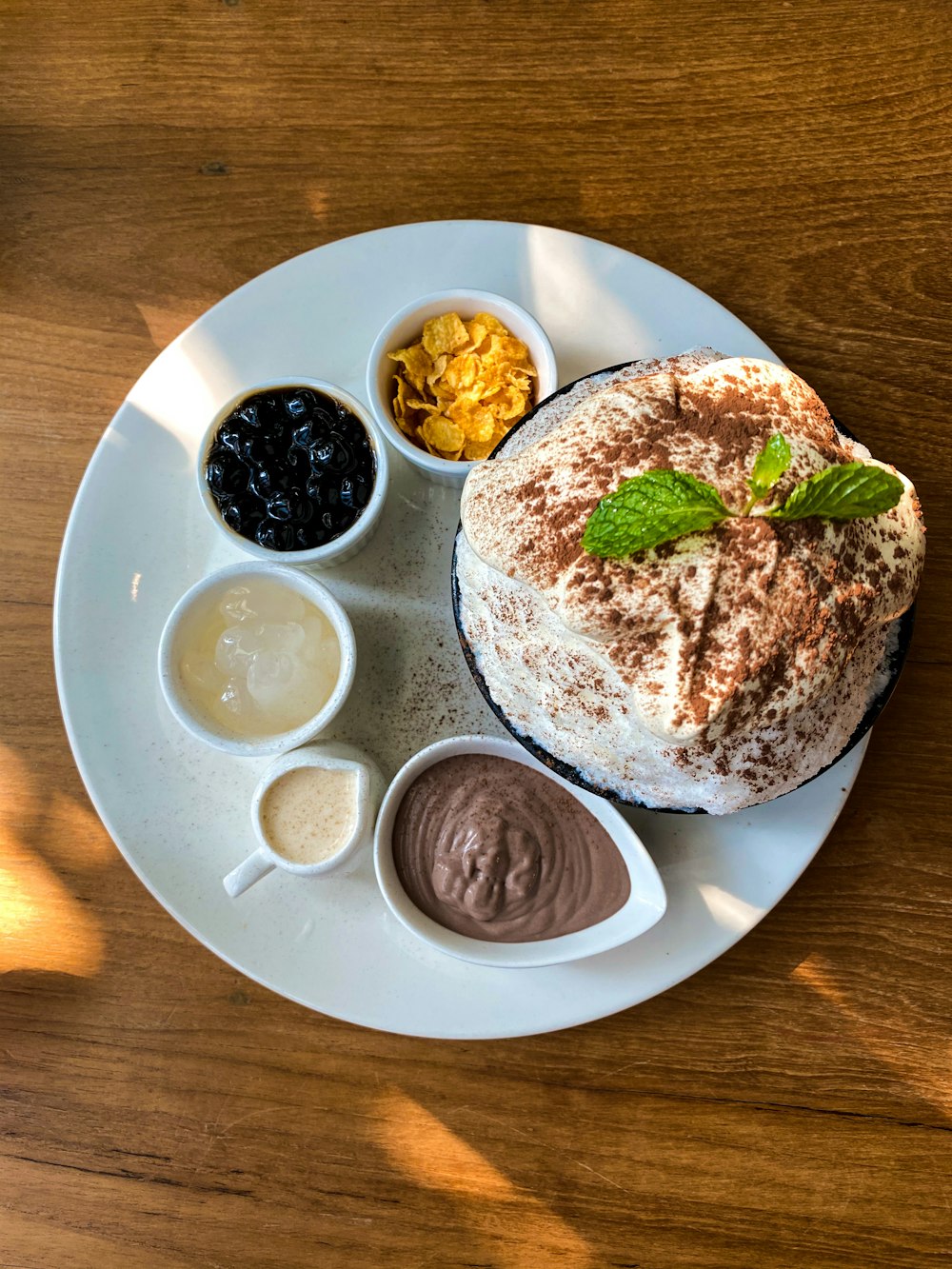 a plate of food on a wooden table