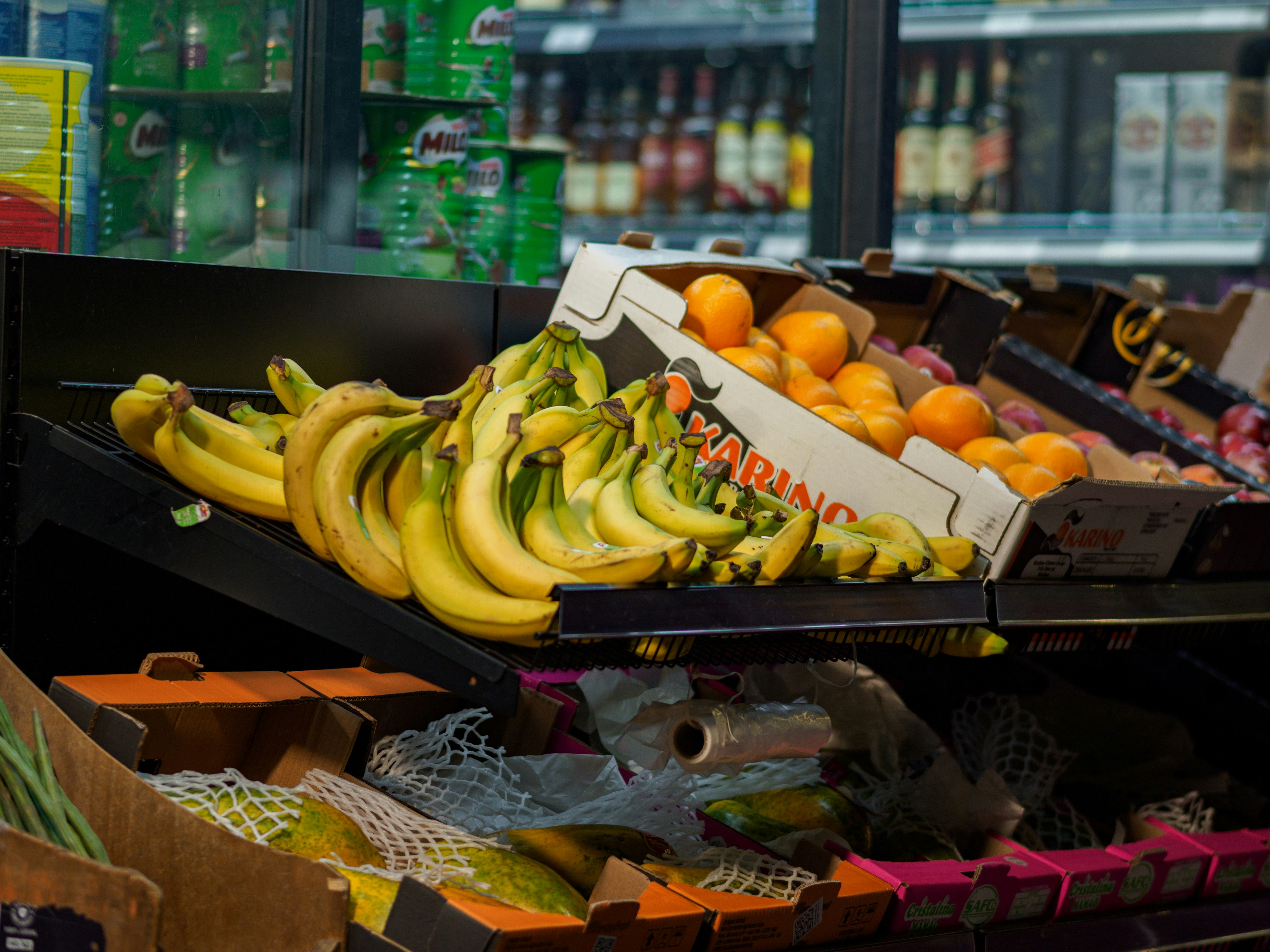 Fresh produce section with IoT sensor on shelf, illustrating real-time data collection for aggregation pattern integrations.