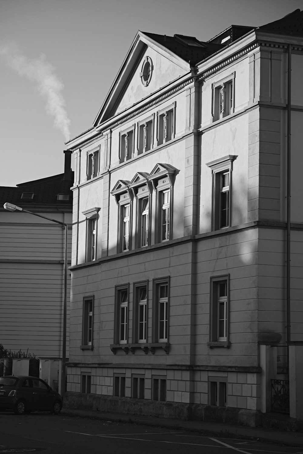 a black and white photo of a large building