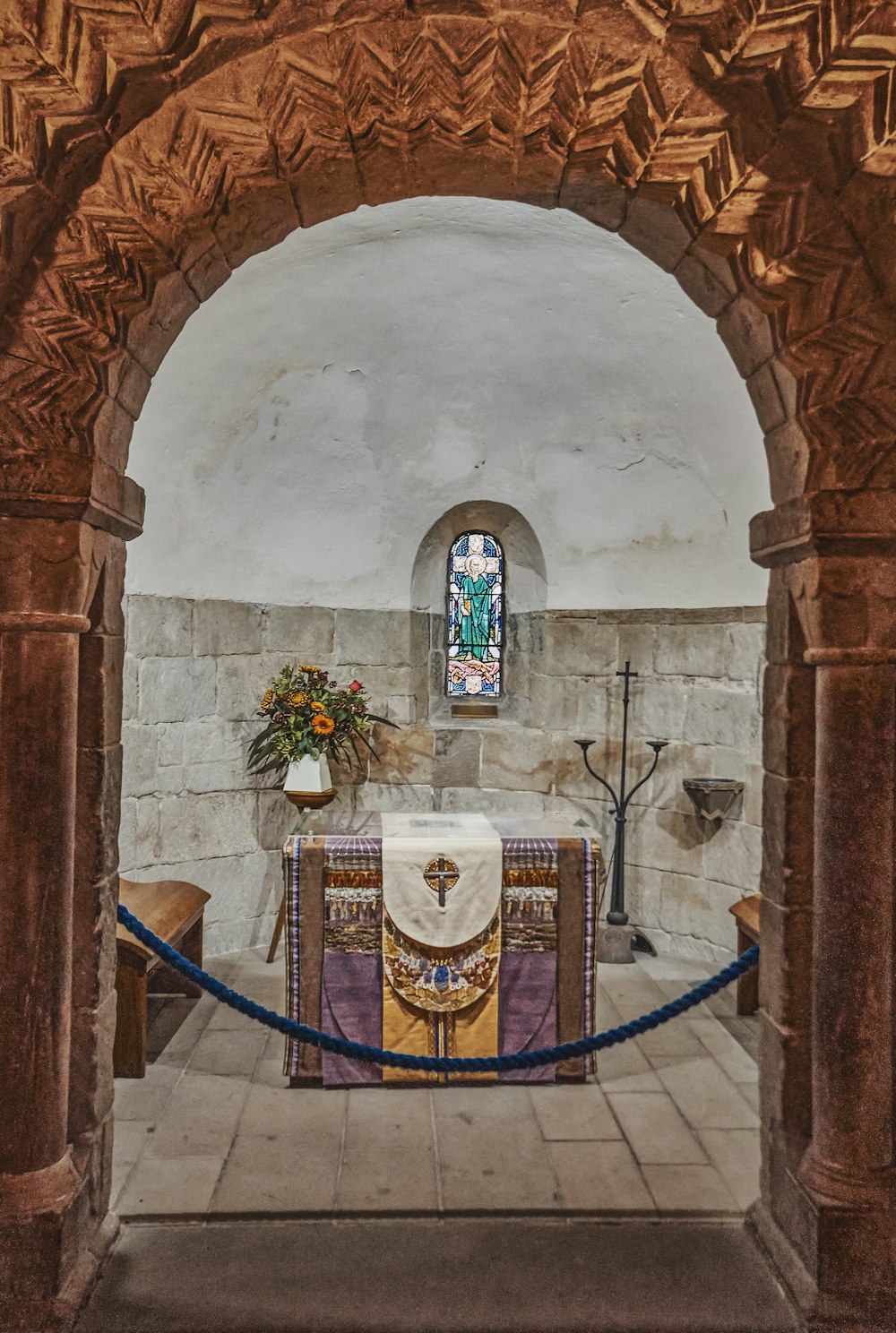 a painting of a priest's altar in a church