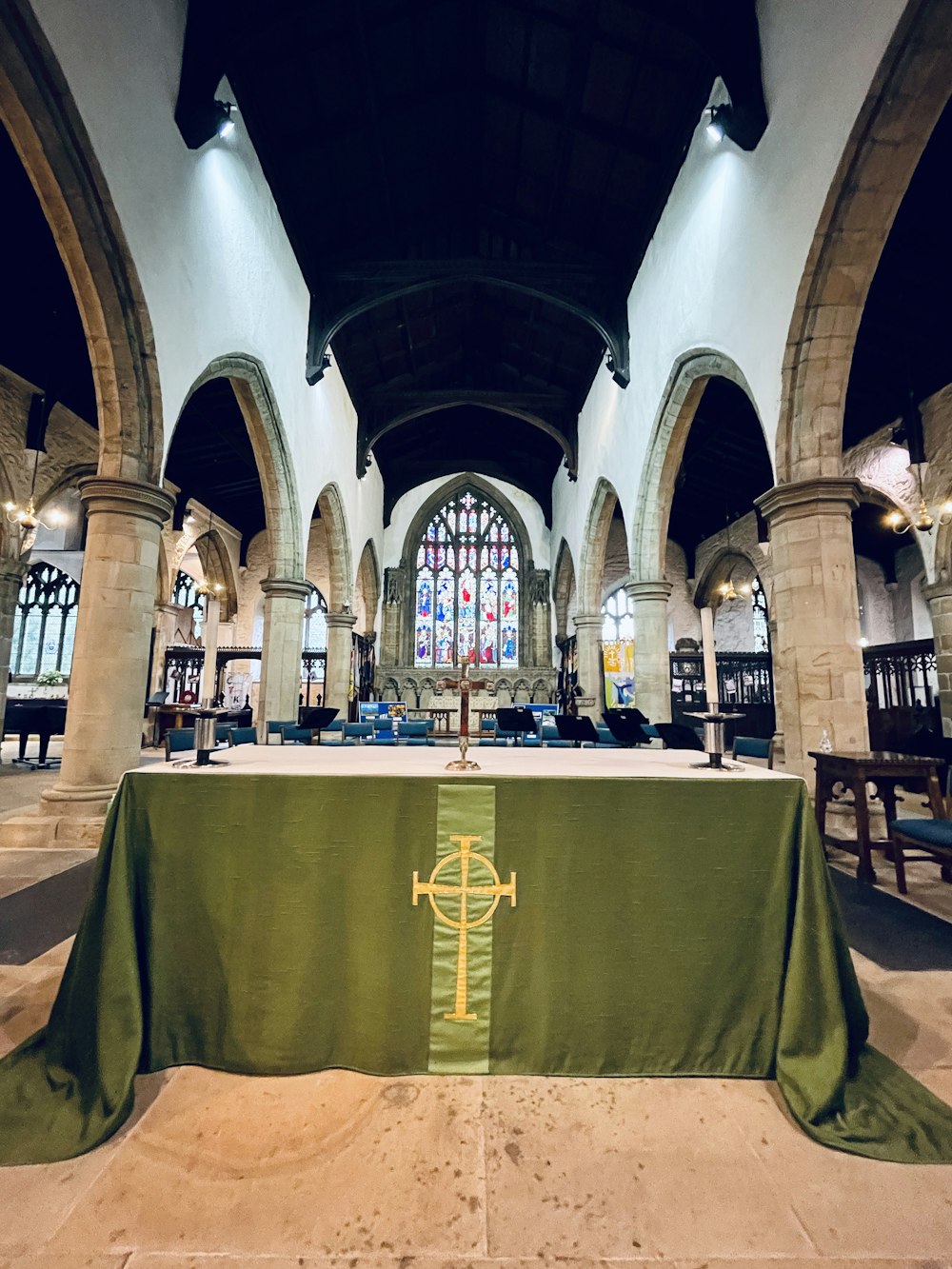 a church with a green table cloth on it